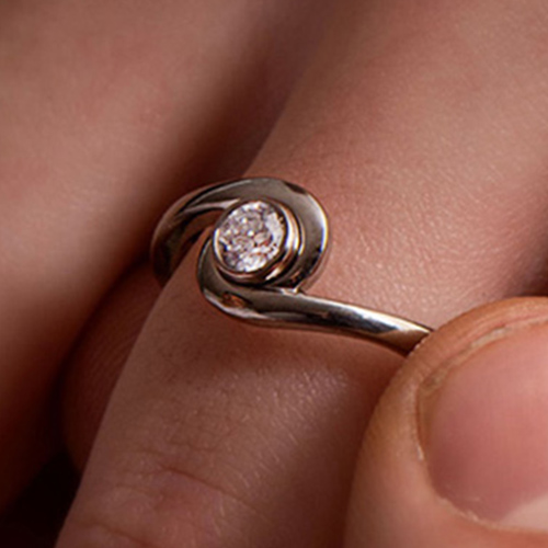 Diamond setting and bespoke wedding rings by Prism Design Ltd.