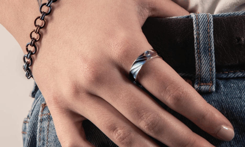 Deep carved titanium ring from Ti2.